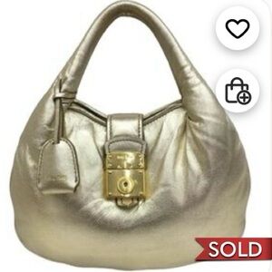 Authentic Miu Miu gold puffer bag